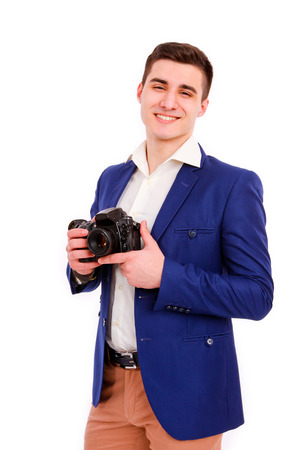 Male photographer with his camera isolated on the white backgroundの写真素材