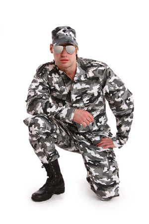 Attractive soldier on white background isolatedの写真素材