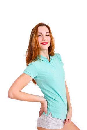 Portrait of attractive girl on a white background isolatedの写真素材