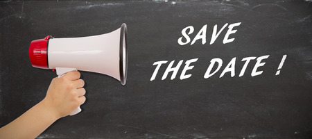Hand holding megaphone - Save the date!の写真素材
