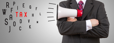 businessman holding megaphone - Taxの写真素材