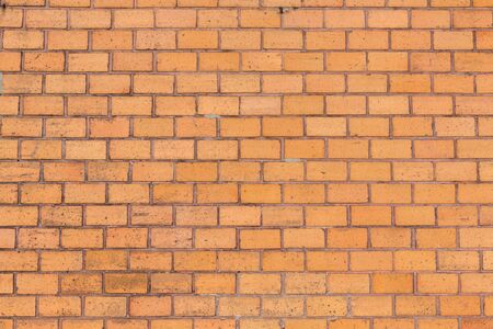 Orange brick wall textureの写真素材