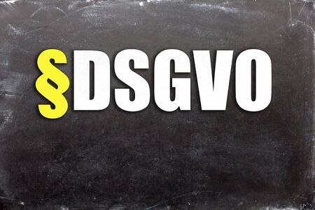 "DSGVO" on a blackboardの写真素材