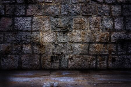 Dark stone vintage wall backgroundの写真素材
