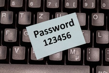 Password security. Office sticker on the computer keyboard