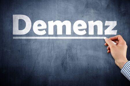 Dementia word written on blackboard, Dementia is the German word for dementia.の写真素材