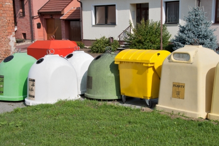 Color cut bins for recycling in the village center.の写真素材