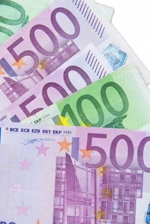 Euro banknotes on the table on a white background.の写真素材