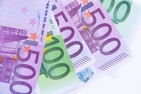 Different values of euro banknotes on a white background.の写真素材