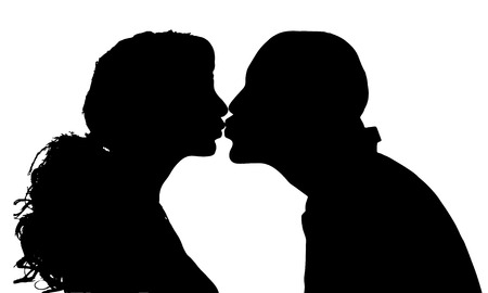 Vector silhouettes man and woman in profile.のイラスト素材