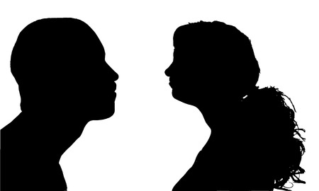 Vector silhouettes man and woman in profile.のイラスト素材