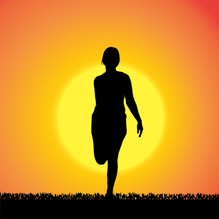 silhouette of woman on a orange background.のイラスト素材