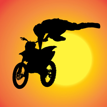 silhouette of extreme jumps on a motorbike.のイラスト素材