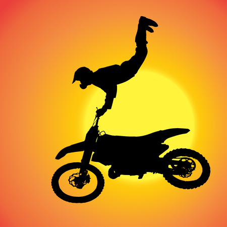 silhouette of extreme jumps on a motorbike.のイラスト素材