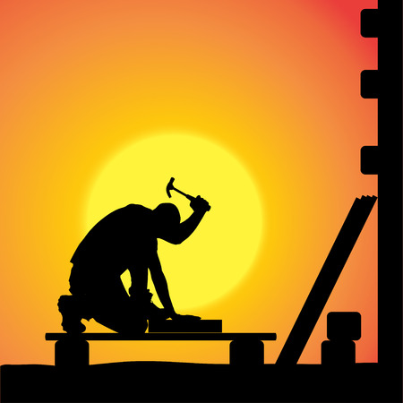 silhouette of a man working with tools at sunset.のイラスト素材