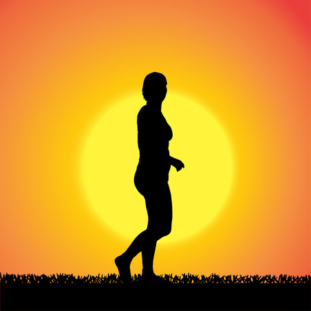silhouette of woman on a orange background.のイラスト素材