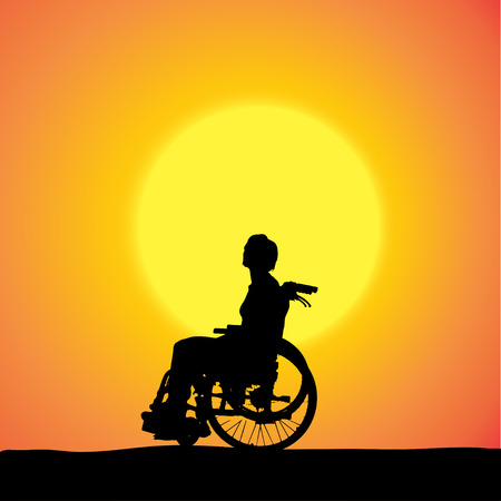 silhouettes of woman in a wheelchair at sunset. のイラスト素材