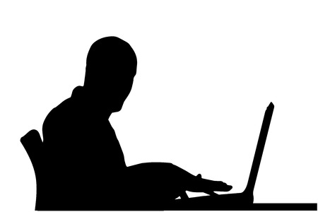 Vector silhouette of a man sitting at a computer on a white background.のイラスト素材