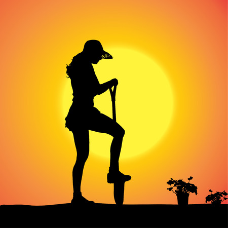 Vector silhouette of a gardener in the garden at sunset.のイラスト素材