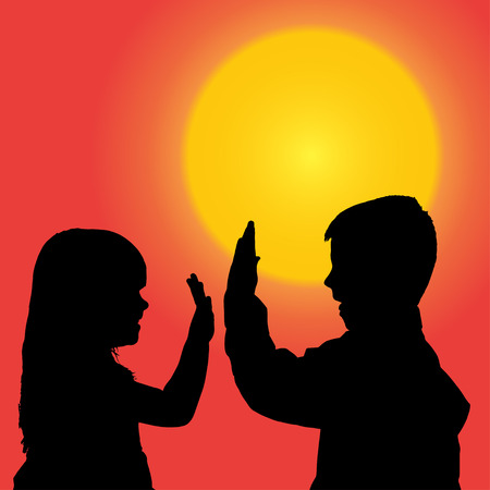 Vector silhouette of a children at sunset.のイラスト素材