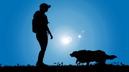 Vector silhouette of a woman with a dog on a meadow.のイラスト素材