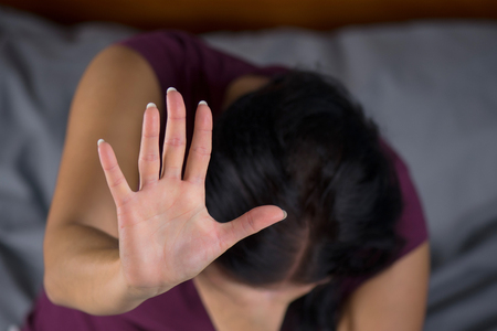 Wife with aggressive husband in domestic violence.