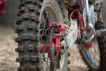 Back view to the wheel of motocross bike.の写真素材