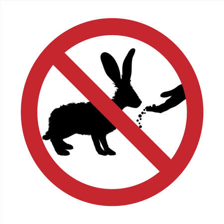Vector silhouette of do not feeding rabbit mark on white background. Symbol of prohibition with animal.のイラスト素材
