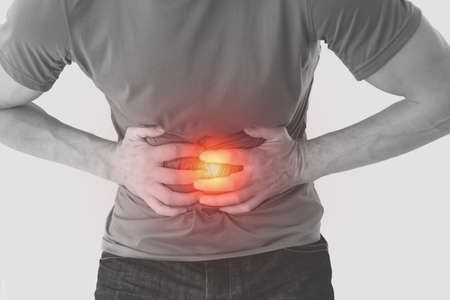 Man suffering from abdominal pain.の写真素材