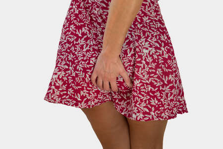 Woman with health problems. Hemorrhoids and intestinal issues.の写真素材