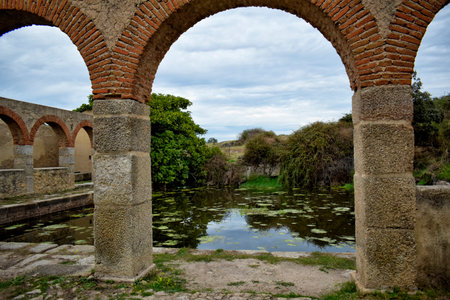 Old Laundry - Arches of the Old Laundry of Trujillo. Old and historic building, in the province of Caceresの写真素材