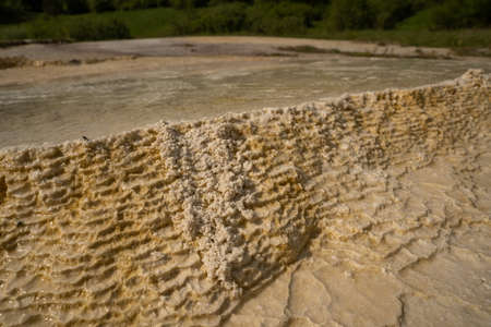 Travertine cascade lake, detail on a sunny bottom.