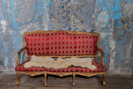 Old abandoned vintage interior with broken sofaの写真素材