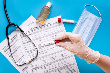Protective medical face mask in the hands of a medic. Mask for protection against influenza,...