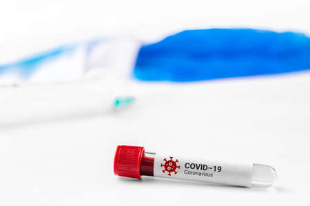 Test tube with blood test for coronavirus 2019-nCov. Covid-19 respiratory disease outbreak. SARS.の写真素材