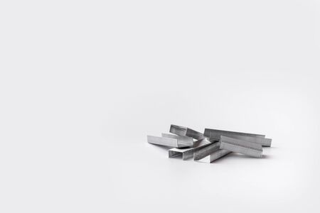 Stapler staples isolated on a white background. Close-up. Copy space. Space for textの写真素材