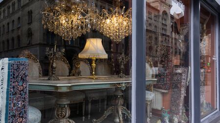 Chair and table in the Baroque style in a shop windowの写真素材