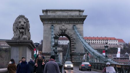 Budapest Hungary 03 15 2019 locals celebrate the national holiday on the Chain Bridge in Budapestのeditorial素材