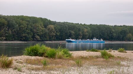 a cargo ship passing through the Danube.の写真素材