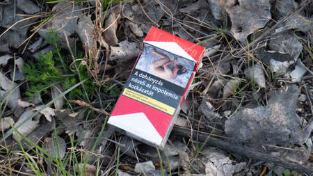 Gyor Hungary 03 31 2020: Smoking increases the risk of impotence inscription on a cigarette box.のeditorial素材