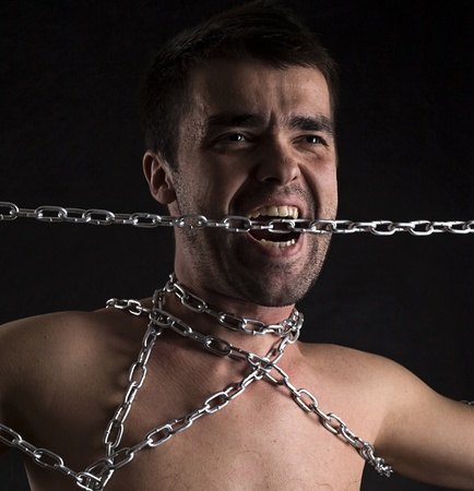 Portrait of the man in chainsの写真素材