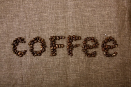 Photo of grains of coffee on a sackingの写真素材