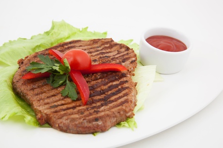 Photo of grilled meat on a plate