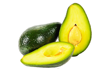 A half of ripe avocado against white backgroundの写真素材