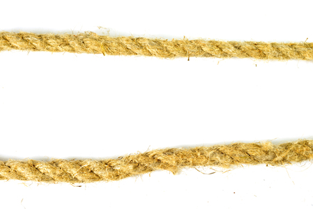 Rope made of linen fiber or natural hemp close-up (isolated on white)の写真素材