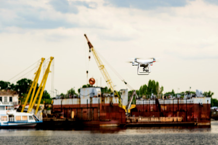 Foreman piloting drone at containers port , Business logistic concept, import and export conceptの写真素材