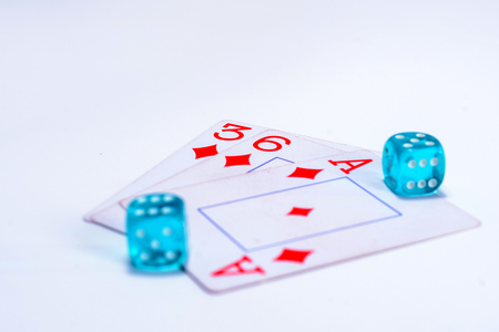A playing cards, dice on isolated white backgroundの写真素材