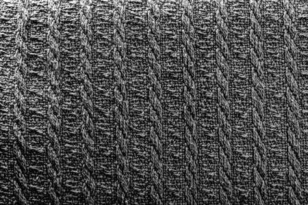Smooth loops of knitted fabric as a background for the presentation of works.の写真素材