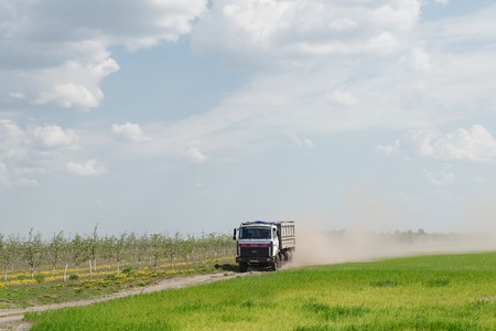 Gomel, Belarus - May 4, 2016: a truck with the awning performs livestock transportation in agro OCTOBER.のeditorial素材