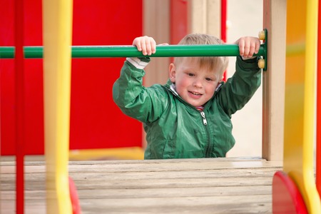 children play on the playground. early spring.